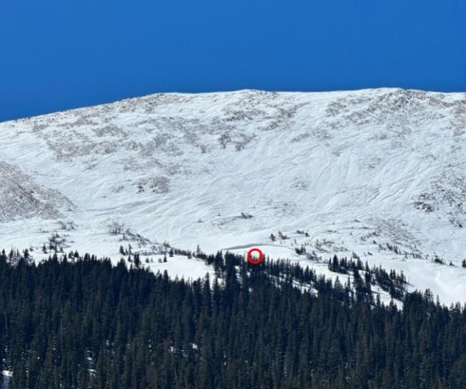 <b>Figure 4:</b> The red circle shows Worker 1’s approximate location when the avalanche released. (Image taken April 9, 2024). (<a href=javascript:void(0); onClick=win=window.open('https://classic.avalanche.state.co.us/caic/media/full/acc_876_52630.jpg','caic_media','resizable=1,height=820,width=840,scrollbars=yes');win.focus();return false;>see full sized image</a>)