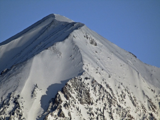 <b>Figure 2:</b> Fracture line visible in the "Big Spork" right of center in this photo taken 12/16/19. Gothic Mountain. This avalanche ran in early December, with this avalanche "repeating" on the same bed surface. (<a href=javascript:void(0); onClick=win=window.open('https://classic.avalanche.state.co.us/caic/media/full/obs_57955_28452.jpg','caic_media','resizable=1,height=820,width=840,scrollbars=yes');win.focus();return false;>see full sized image</a>)